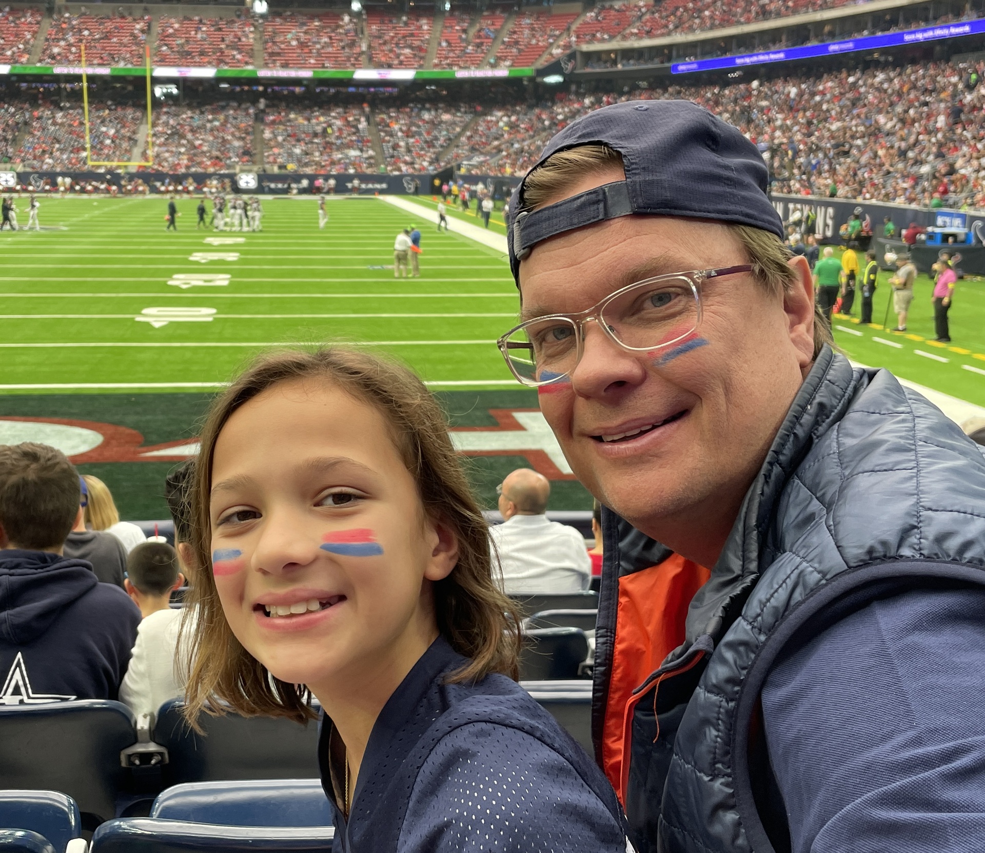 Scott Boyd outside the office at a Houston football game.